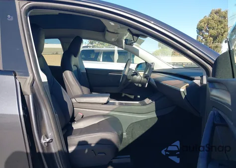 2023 Tesla Model Y Rwd из США, поврежденный, VIN 7SAYGDED5PF980101